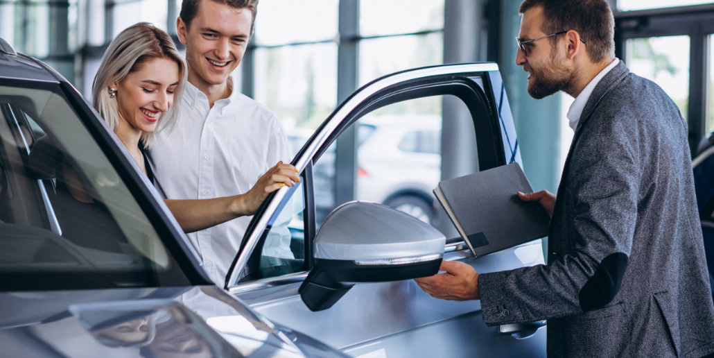 Young family buying car